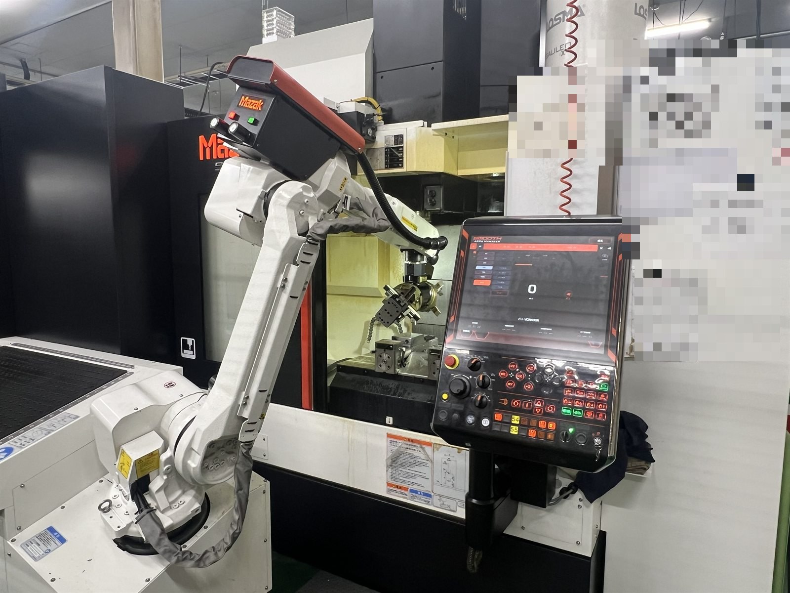 神津精機に設置された立形マシニングセンタ VCN-430AとMA-35/400ロボットシステム
